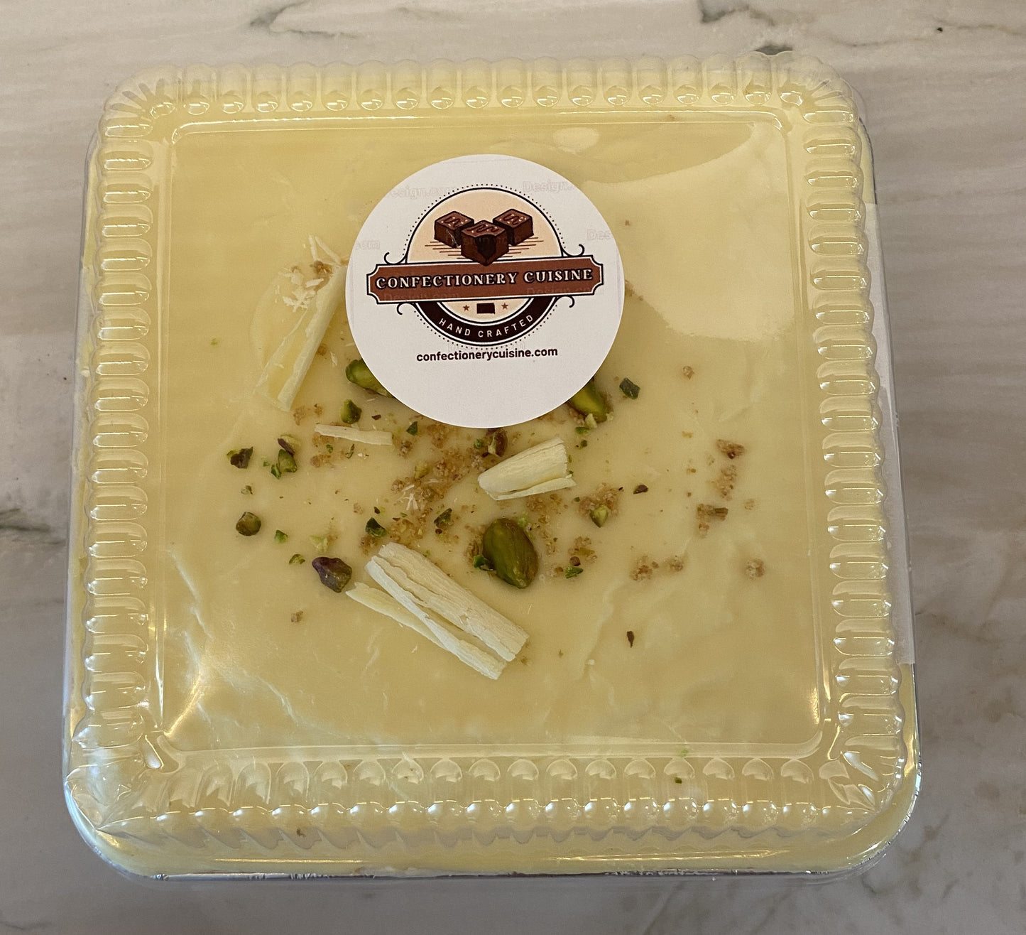 Lemon Pistachio Cheesecake White Chocolate Genache Top - Confectionery Cuisine